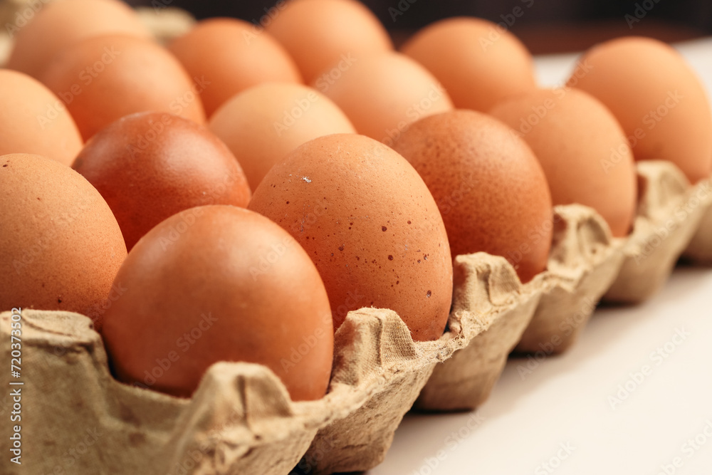 Photography of macro detail of brown eggs with warm light passing over them. Food concept. Photography of macro detail of brown eggs with warm light passing over them. Food concept.