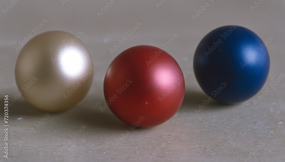 Three balls of different colors on a table Three balls of different colors on a table