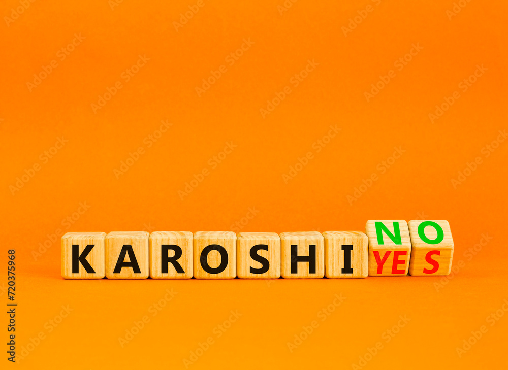 Karoshi yes or no symbol. Concept words Karoshi Yes or No on beautiful wooden blocks. Beautiful orange table orange background. Business and stop karoshi concept. Copy space. Karoshi yes or no symbol. Concept words Karoshi Yes or No on beautiful wooden blocks. Beautiful orange table orange background. Business and stop karoshi concept. Copy space.