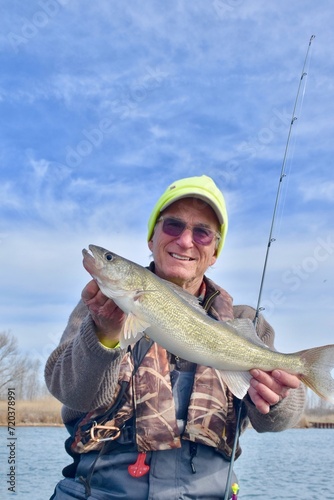 Fisherman with a walleye