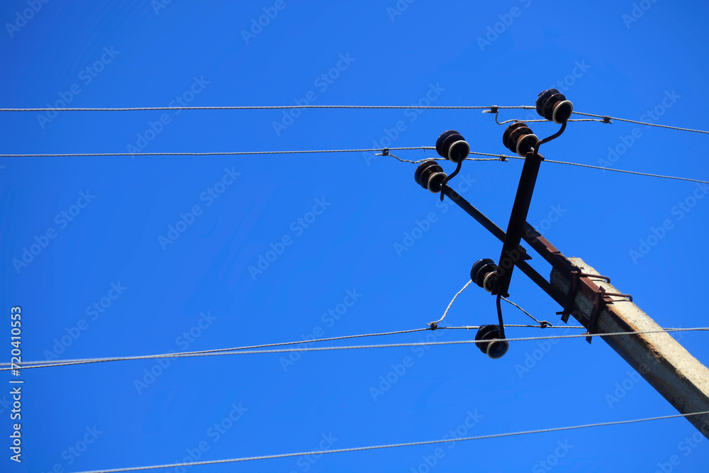 Electrical wires on blue sky background Electrical wires on blue sky background