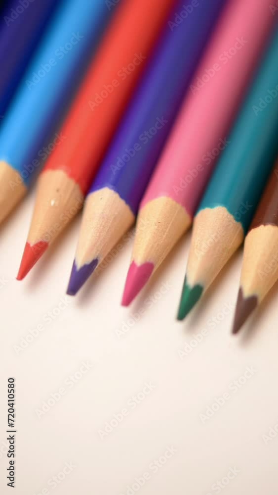 Rotating colorful wooden pencils, vertical video Rotating colorful wooden pencils, vertical video