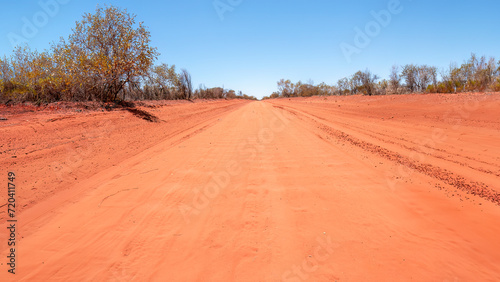 The Ernest Giles Road in Australia's Northern Territory. It is a 100km long unsealed dirt track leading to the Stuart Highway photo