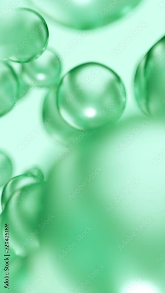 Liquid green oil bubbles macro close up. Abstract cosmetic 3D animation background of fluid circles. Beauty care concept of decorative antioxidant peptide soap spheres in light water background. Liquid green oil bubbles macro close up. Abstract cosmetic 3D animation background of fluid circles. Beauty care concept of decorative antioxidant peptide soap spheres in light water background.