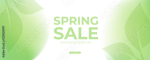 Spring Sale special offer banner. Springtime season background with blurred colors and spring green leaves for business, seasonal shopping promotion and advertising. Vector illustration. © FineVector
