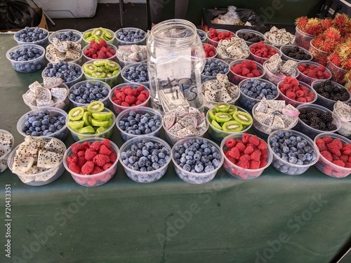 Tropical fruit cut up and placed in bowls to sell at market