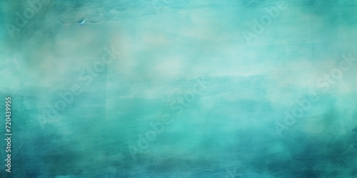 Teal watercolor abstract painted background on vintage paper background © Lenhard