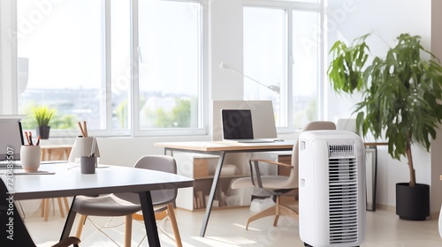 Portable mobile air conditioner in office interior.
 photo