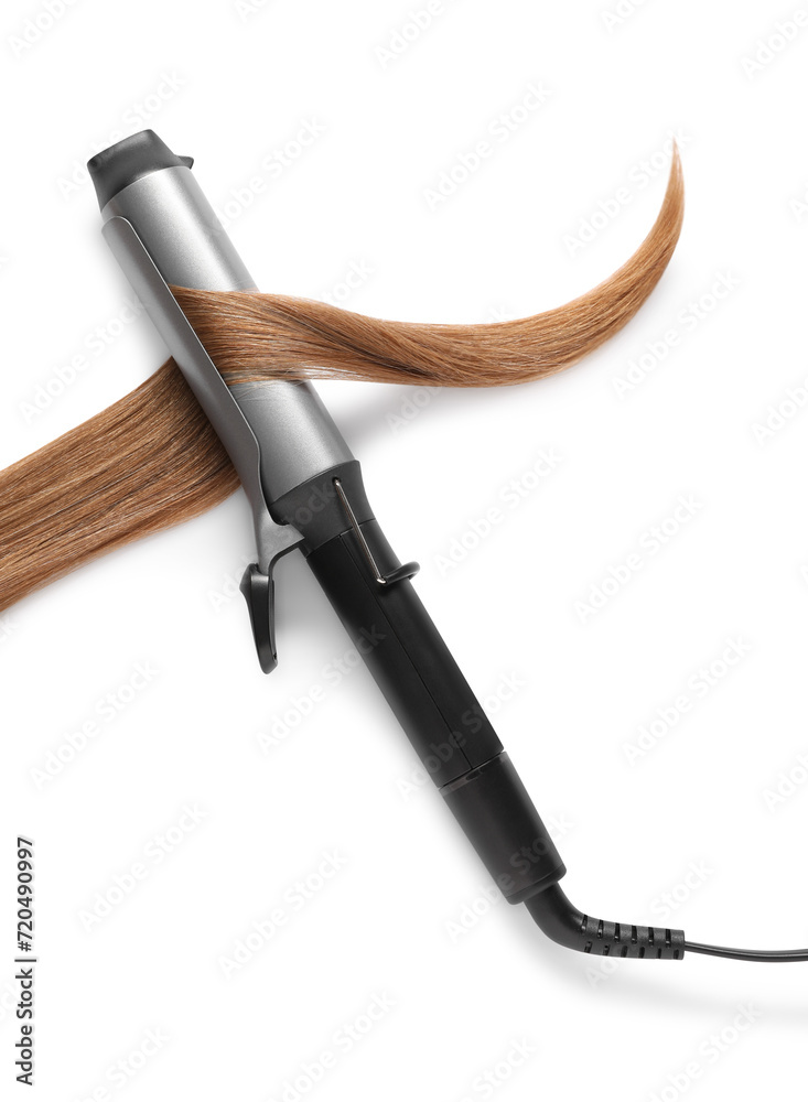Curling iron with hair lock on white background, top view