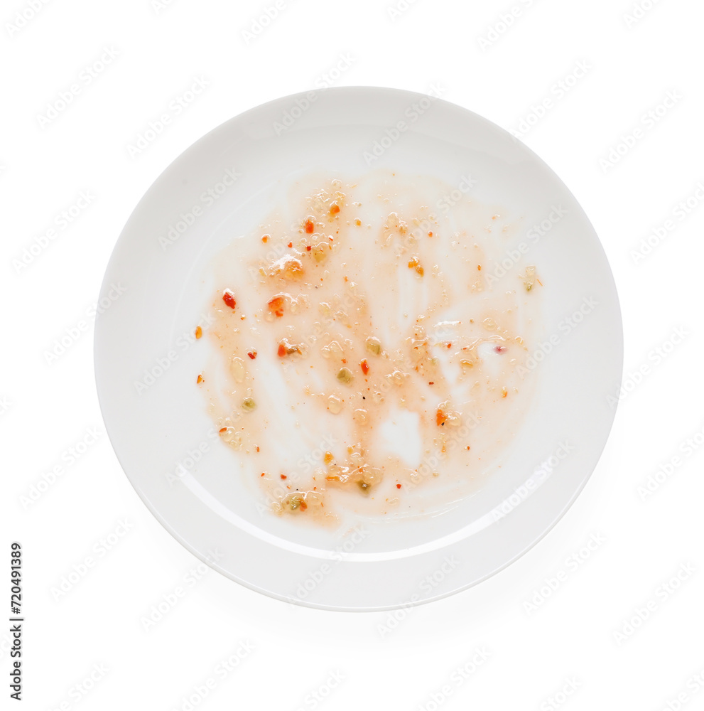 Dirty plate with smeared sauce on white background, top view Dirty plate with smeared sauce on white background, top view