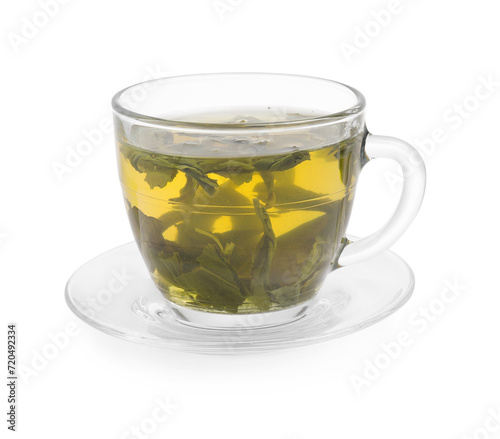 Fresh green tea in glass cup, leaves and saucer isolated on white