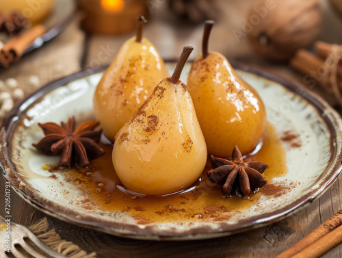 Fototapeta Naklejka Na Ścianę i Meble -  Poached pears in syrup with cinnamon and star anise.
