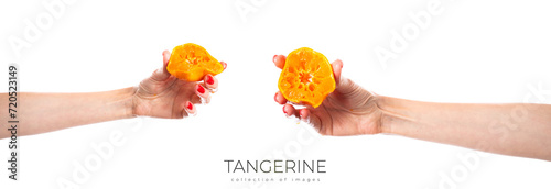 Tangerine in hand isolated on white background.