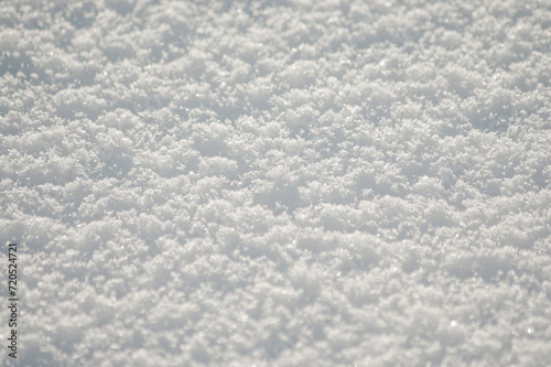 gray background, photo shows snow close-up