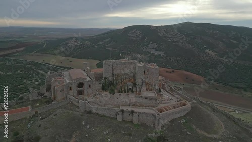 Sunset Over Aldea del Rey - Calatrava Castle's Historic Silhouette