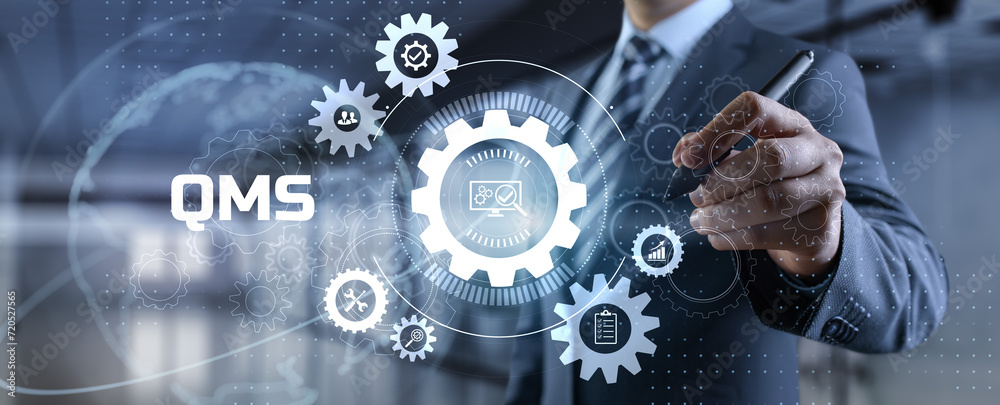 QMS Quality management system. Businessman pressing virtual button. QMS Quality management system. Businessman pressing virtual button.