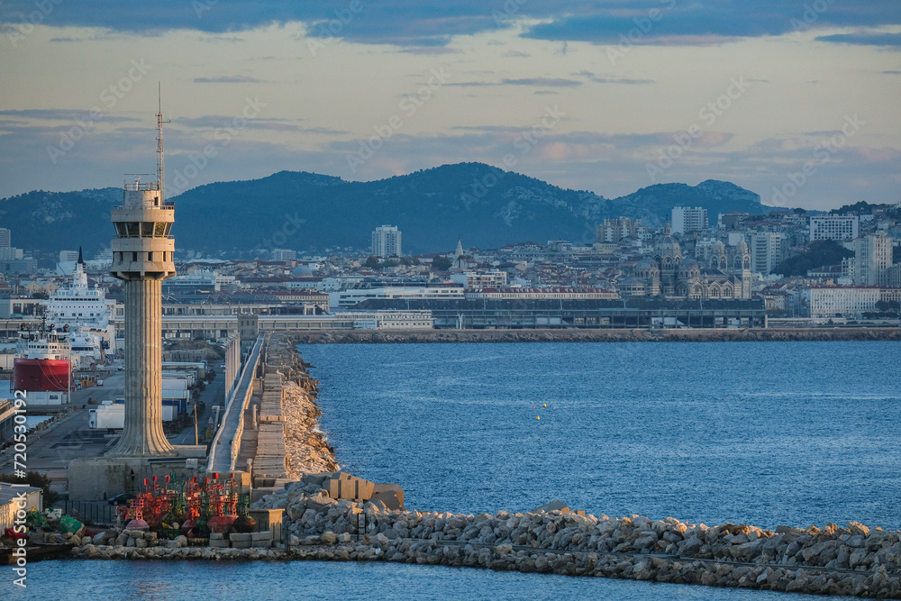 Obraz premium Panoramic sunrise or sunset landscape nature coastal scenery with beautiful fire sky and dramatic cloudscapes in Marseille Provence, France clear sky Mistral