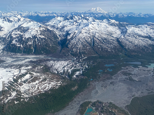 Mount Redoubt Volcano, Tuxedni Bay, Lake Clark National Park in Alaska. Aerial view of Redoubt Volcano an active stratovolcano and highest summit in Aleutian Range.