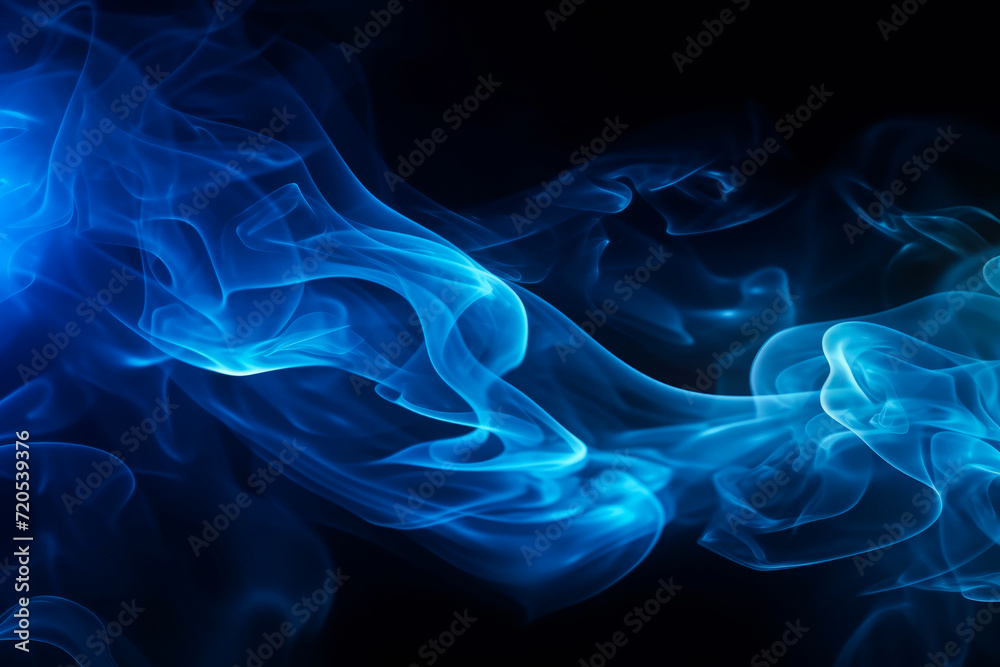 jets of vibrant blue smoke on a black background. abstract texture of flying smoke.