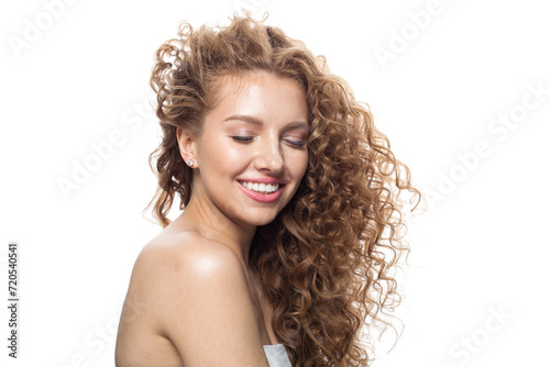 Photography Carefree redhead female model with long frizzy ginger hair and clean soft fresh skin posing on white background