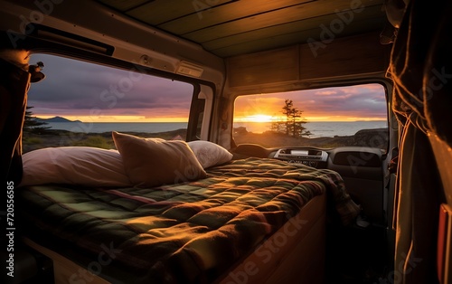 Campervan with sunset in the background. Camping in the mountains.