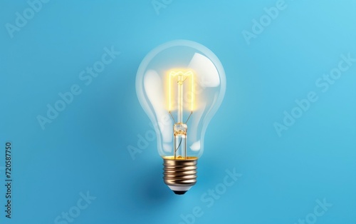 Vibrant Blue Background with a Lit Light Bulb