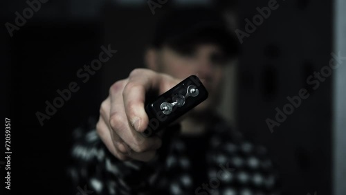 Stun gun in a man's hand, electric discharge, portable shocker, dog repeller photo