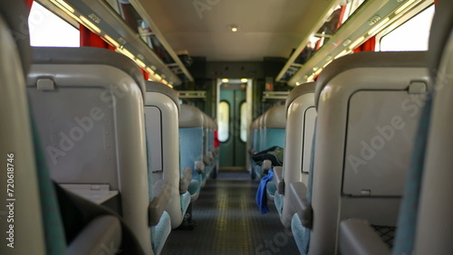 Train corridor interior in motion, walking forward while traveling. European high-speed transportation