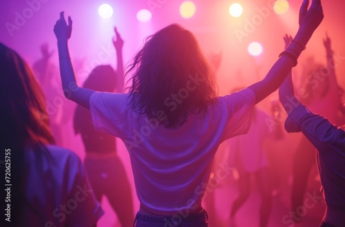 a girl and others dance and drink at a music party dance party