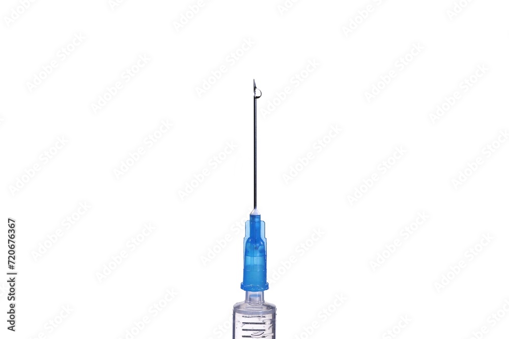 Medical syringe needle with a drop of liquid at the end. Medical syringe needle with a drop of liquid at the end.