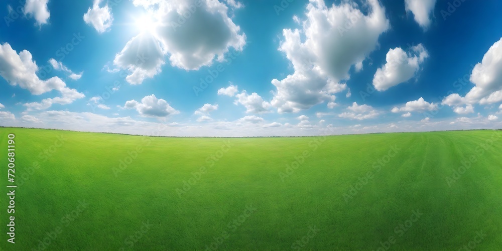 Green lawn with fresh mown grass against a background of blue sky with clouds. Green lawn with fresh mown grass against a background of blue sky with clouds.
