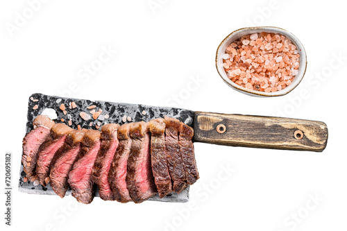 Grilled ramp cap steak on a meat cleaver.  Isolated, Transparent background. 