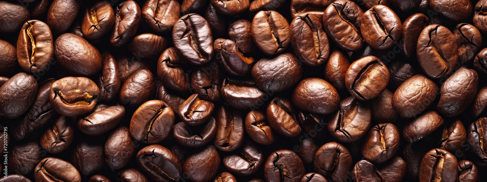 Close-up, high-quality image of densely packed, roasted coffee beans that highlight their texture and color. Close-up, high-quality image of densely packed, roasted coffee beans that highlight their texture and color.