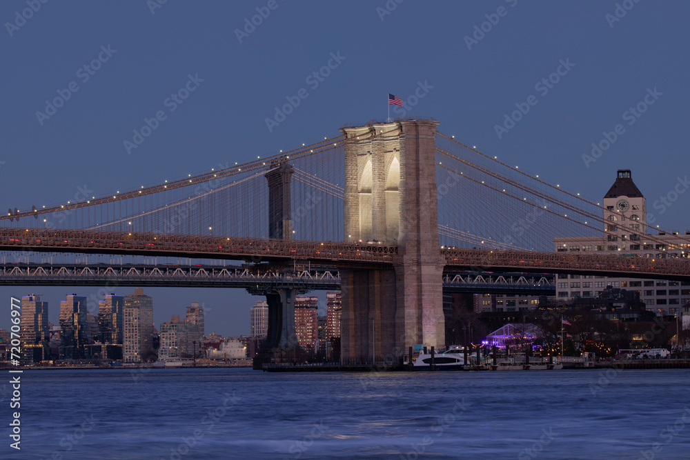 Brooklyn Bridge illuminated with new lights shining on towers	
