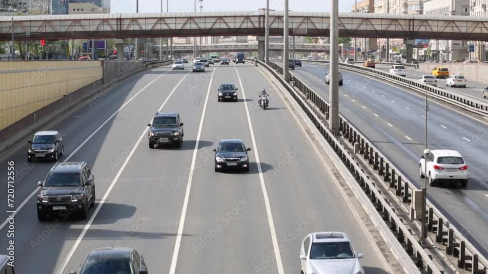 Many cars go on highway Leningradsky Prospect in Moscow Many cars go on highway Leningradsky Prospect in Moscow