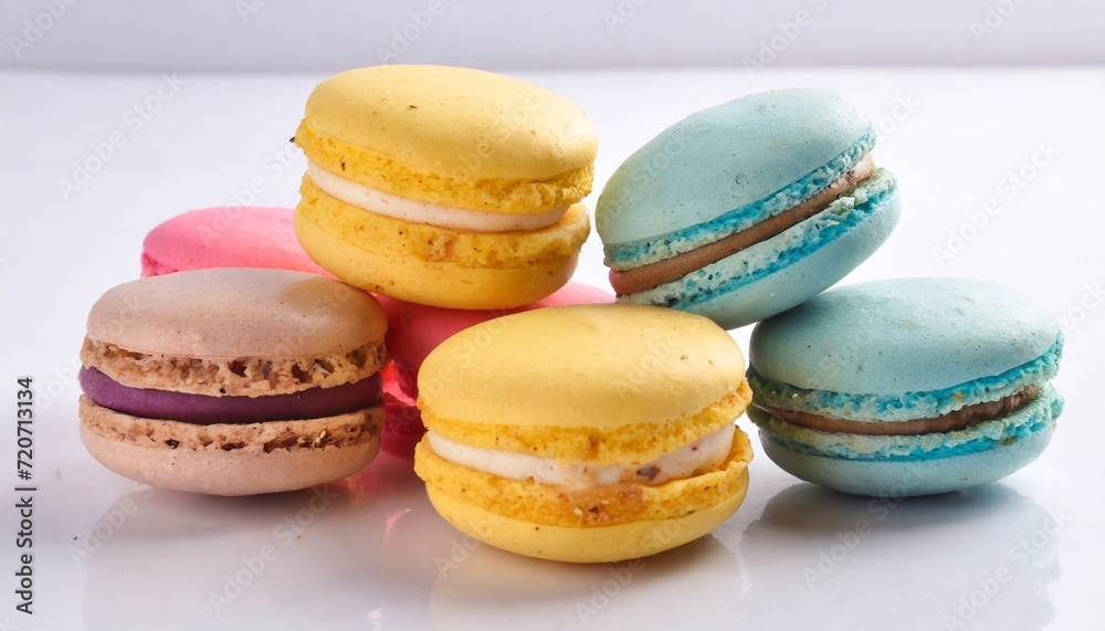 Colorful macaroons on white background. Selective focus. Colorful macaroons on white background. Selective focus.