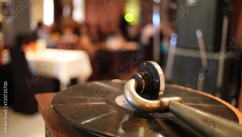 Mechanical reproducer of old gramophone in restaurant close up. photo