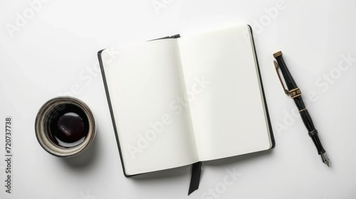 Top view of open blank notepad, ink pen, on white table background photo