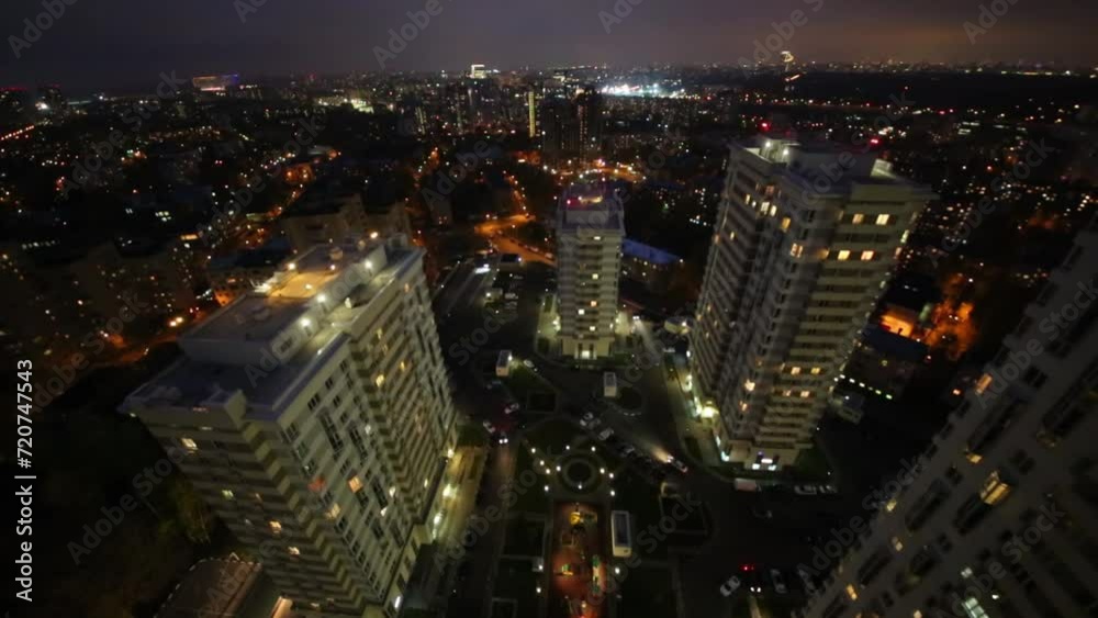 Cityscape with building of residential complex at summer night. Cityscape with building of residential complex at summer night.