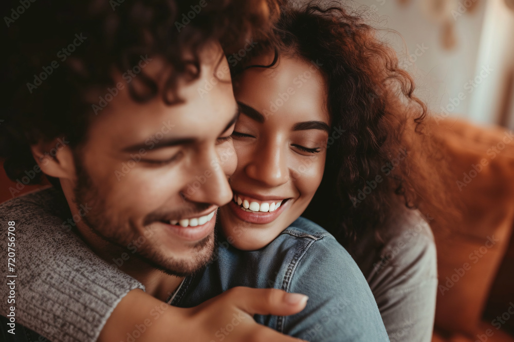A cute couple in love hugging, sharing a heartfelt moment A cute couple in love hugging, sharing a heartfelt moment
