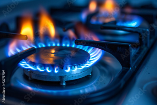 A gas stove with the fire burning, gas energy concept