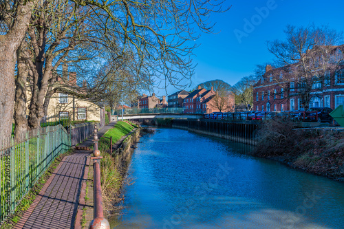 A view down the River Welland in the centre of Spalding, Lincolnshire on a bright sunny day photo