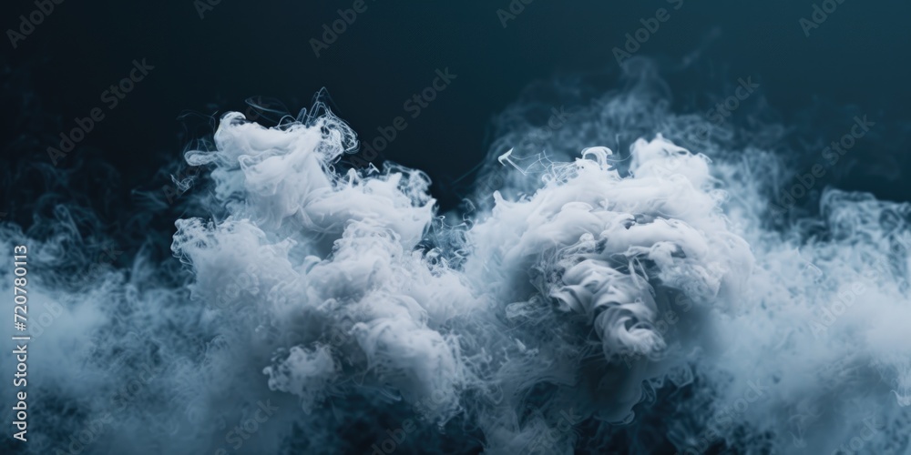 Obraz premium A cloud of smoke fills the air. This image can be used to depict pollution, fire, or a mysterious atmosphere