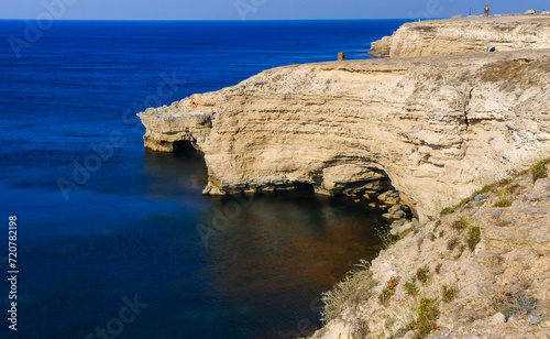 Steep steep coast of limestone rocks in the western Crimea, Tarkhankut Peninsula