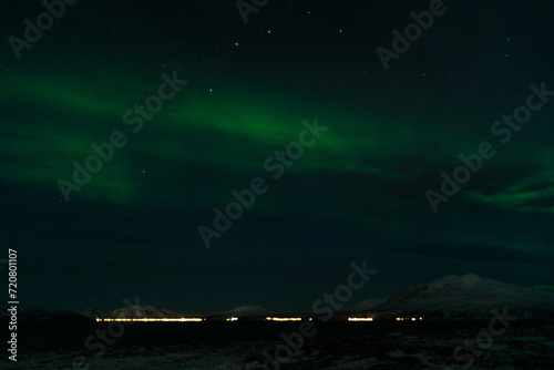 Polar lights on s´the winter sky in winter in Norway