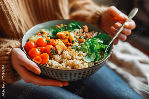 Woman prepared Plant-Based Nutrition meal. She is working on her own book of plant-based recipes, which she will sell through the publishing house.