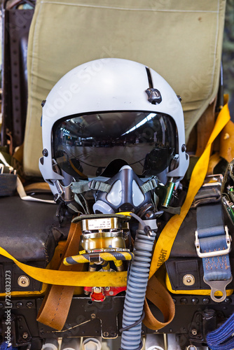 fighter pilot helmet on an ejection seat