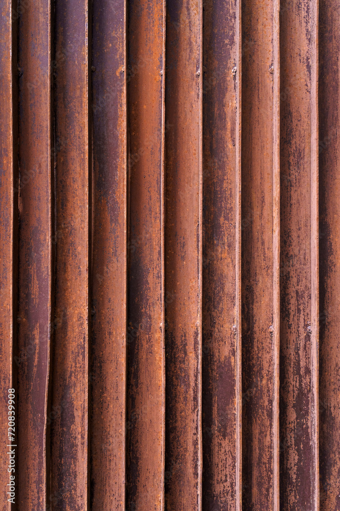 Warm-toned rusty corrugated iron sheet, perfect for creating grunge backgrounds and textured overlays in designs