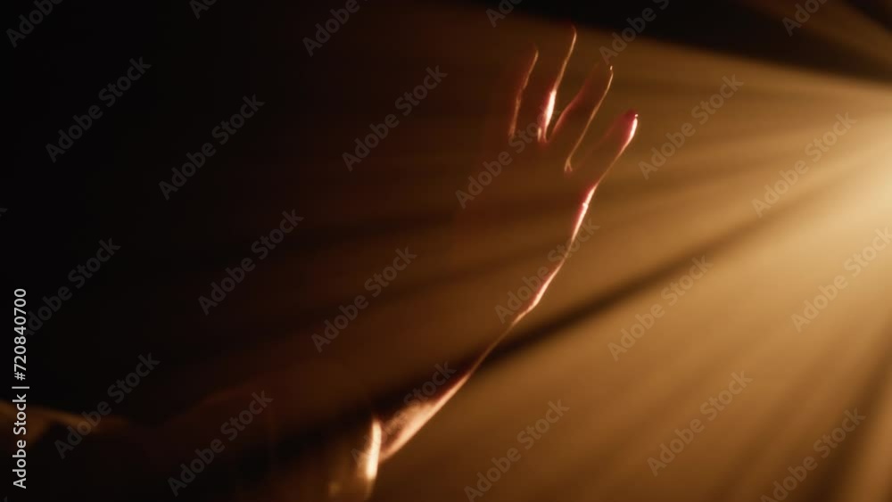 Woman hands enjoying the energy of light ray