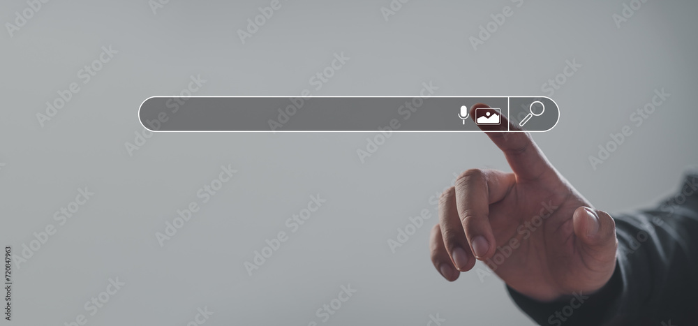 man's hands are finger point to Searching for information. Using Search Console with your website. Data Search Technology Search Engine Optimization. Online business search a job for work